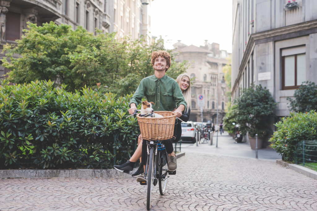couple young in love bicycling